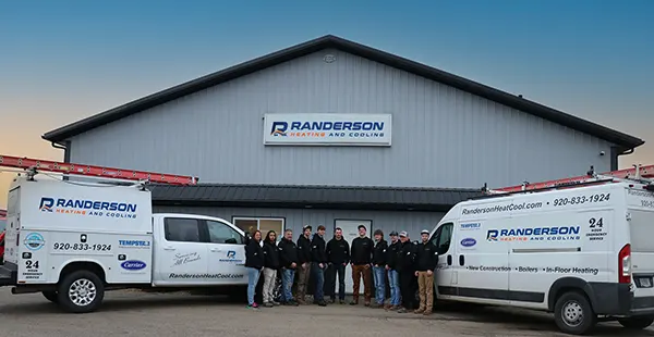 Randerson Heating & Cooling team and service vehicles
